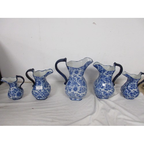 146 - A lovely and shapely set of jugs, graduated, ironstone.