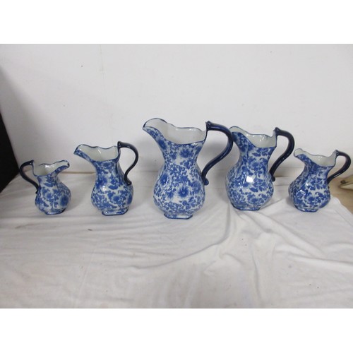 146 - A lovely and shapely set of jugs, graduated, ironstone.