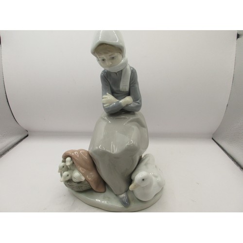 155 - Three Lladro figures - girl with ducks 1267, height 20cm;  girl with basket of flowers 5222, height ... 