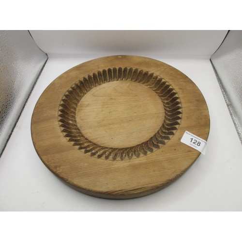 128 - Four wooden shortbread moulds, the largest diameter 31cm, the smallest 8cm