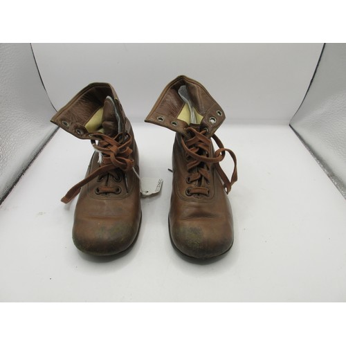 174 - A pair of antique brown leather child's lace up ankle boots, length from heel to toe about 17cm