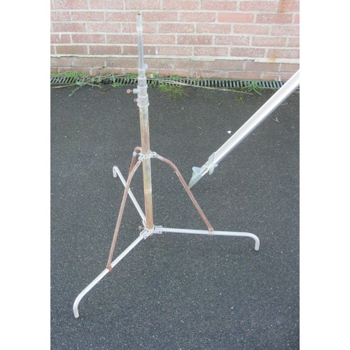 166 - A large tripod with aluminium extending legs, and one other metal tripod