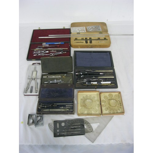 140 - An assortment of technical drawing and draughtsman instruments, compasses, pens, etc some in cases