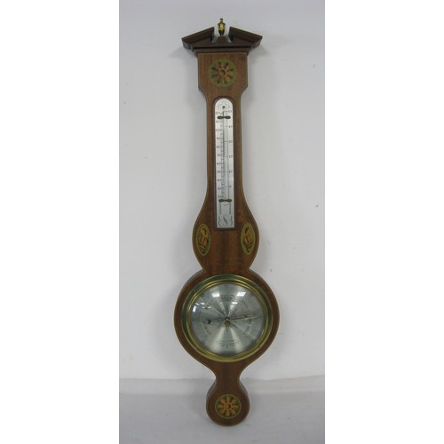 141 - A Comitti of London mahogany mounted aneroid banjo barometer. Height 67cm