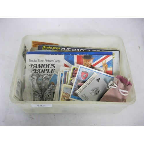 145 - A tub of Brooke Bond tea cards, some loose and some in books, together with a specimen of rock cryst... 