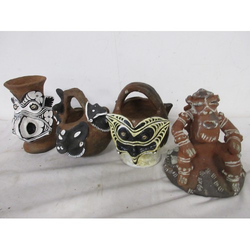 48 - A selection of Kenyan ethnic pottery with colourful finish