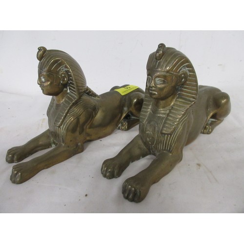 50 - An antique matching pair of heavy cast brass Sphinx in very nice order