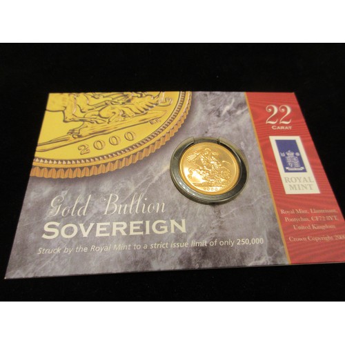100 - A 2000 HM Queen Elizabeth II full sovereign, in bright uncirculated condition, sealed in Royal Mint ... 