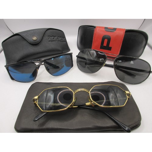 18 - 3 vintage pairs of Police brand sunglasses in cases, all in good order