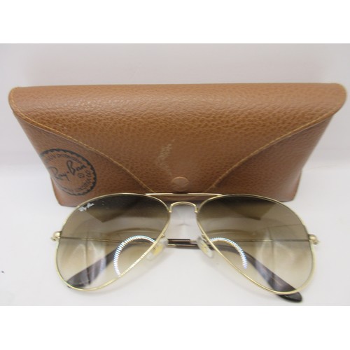 19 - A vintage pair of Ray Ban aviator style sunglasses in soft case
