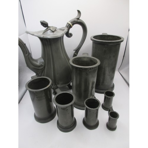 25 - A heavy set of 7 French graduated pewter measures of some age, marked for Litre down to centilitre, ... 