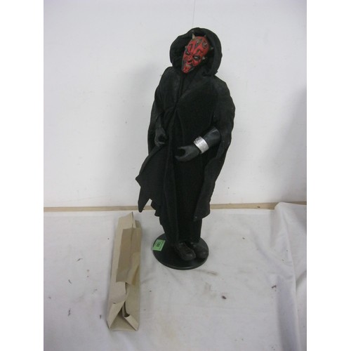 136 - 18 Inch figurine of Darth Maul complete with his original light Saber . Magnetic version.