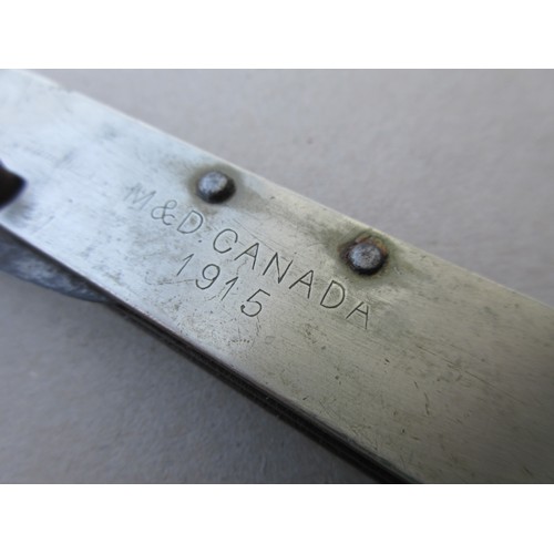 169 - A 1915 dated M&D Canada military clasp knife, the blade by Thomas Turner & Co of Sheffield, in good ... 
