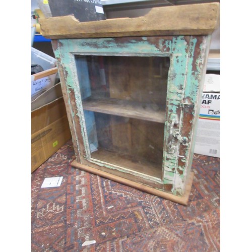 167 - A chabby chic glazed wall cabinet with remains of paint, 23