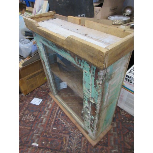 167 - A chabby chic glazed wall cabinet with remains of paint, 23