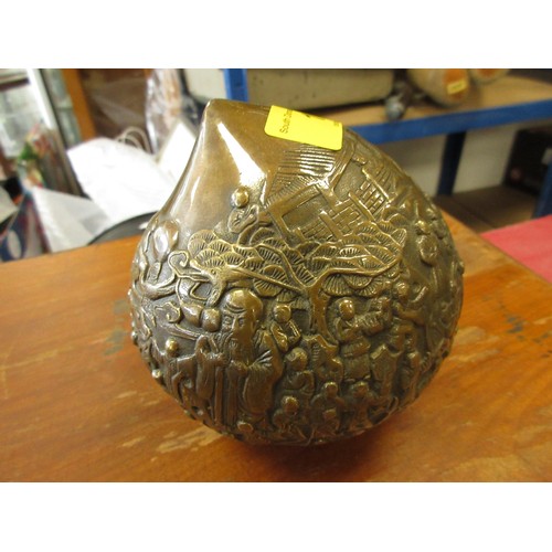 11 - A bronze Oriental peach with decorative finish, in good order