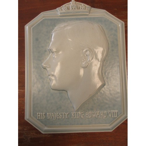 18 - A Poole pottery wall plaque by Harold Brownsword (signed to reverse), depicting a relief cast bust o... 