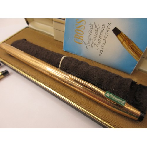 20 - Gold-plated Cross ballpoint pens and Cross gold-plated soft tip pens. (1)  A Cross ballpoint pen eng... 