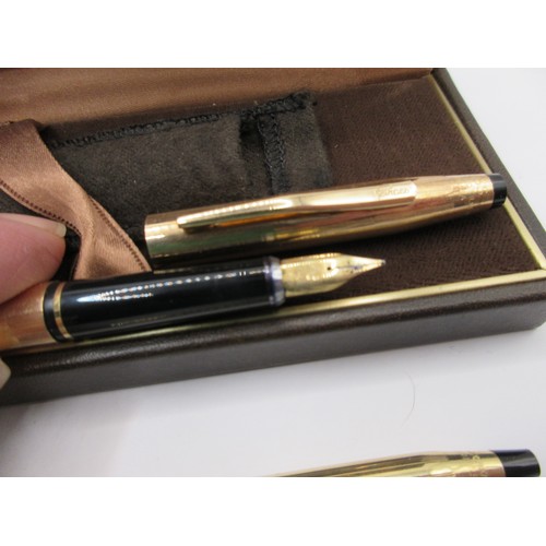 21 - A Cross ballpoint pen with applied corporate branding, and a Cross fountain pen, with a slight a/f C... 