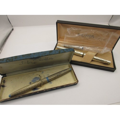 22 - Two Sheaffer fountain pens.   (1) A Lady Sheaffer fountain pen, basketweave finish with periwinkle e... 