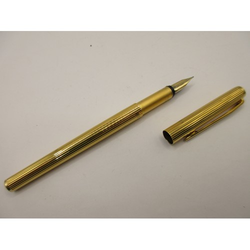 25 - A Montblanc Noblesse Slimline gold-plated fountain pen with nib marked 585, signs of light use, engr... 