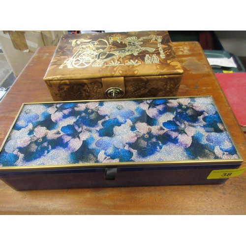 38 - A Marks & Spencer blue jewellery box with hinged lid, a leather-effect jewellery box with lift-out t... 