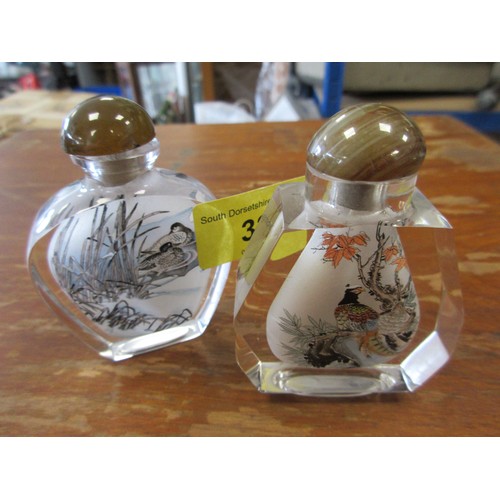 32 - Two Chinese snuff bottles internally painted with birds, agate stoppers, height 7.5cm