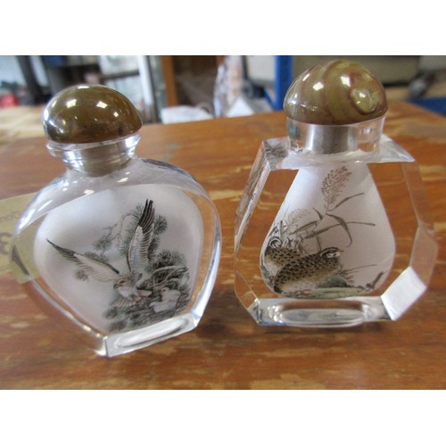 32 - Two Chinese snuff bottles internally painted with birds, agate stoppers, height 7.5cm