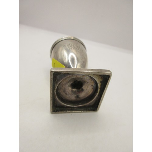 45 - A sterling silver pepper pot of classical design on pedestal base, incomplete hallmarks indicate it ... 