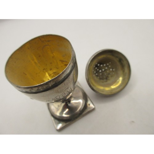 45 - A sterling silver pepper pot of classical design on pedestal base, incomplete hallmarks indicate it ... 