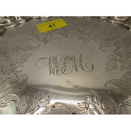 47 - A substantial circular sterling silver salver on scrolled feet with scrolled acanthus rim, script in... 