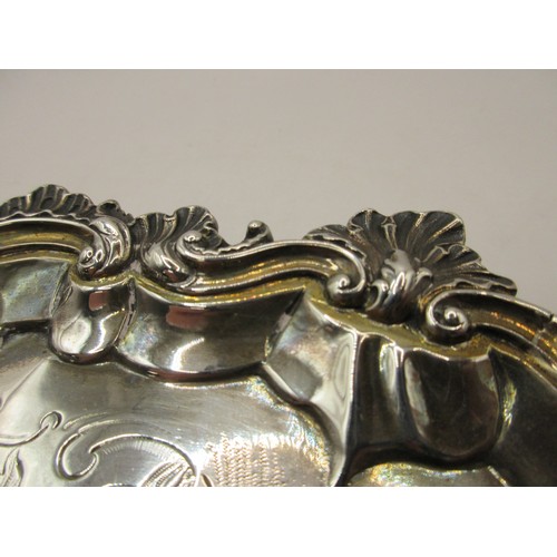 47 - A substantial circular sterling silver salver on scrolled feet with scrolled acanthus rim, script in... 