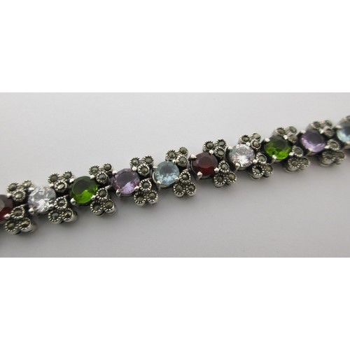 72 - 925 silver bracelet set with multi-colour stones and marcasite, gross weight approx. 33.7g