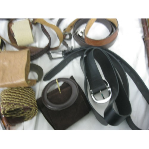 29 - A basket of leather goods including handbags, purses etc