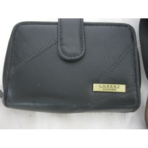 29 - A basket of leather goods including handbags, purses etc