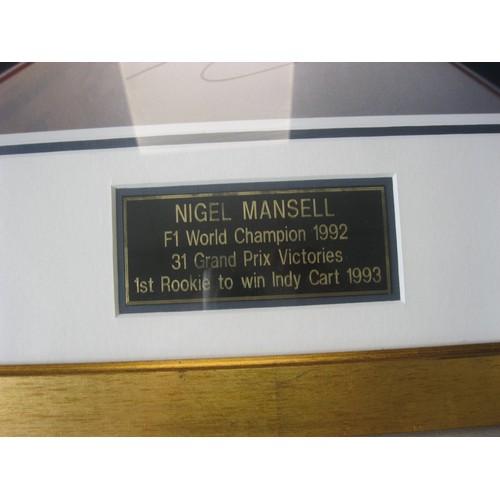 9 - A signed print of Nigel Mansell at the wheel of a Renault Williams, framed and glazed, with MSC Cert... 