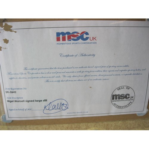 9 - A signed print of Nigel Mansell at the wheel of a Renault Williams, framed and glazed, with MSC Cert... 