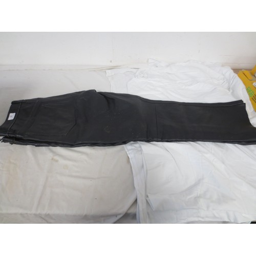 31 - Two pairs of Skintan leather motorcycle trousers - waste 34 leg 29, and waste 40 leg 29