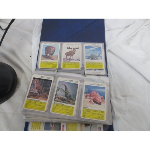 40 - A III Betacom 'Speakeasy' vintage style candlestick touch tone telephone, and an album of assorted T... 