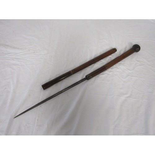 191 - A wooden shafted sword stick with a 36.5cms triangular section blade. Overall length of 72cms