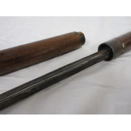 191 - A wooden shafted sword stick with a 36.5cms triangular section blade. Overall length of 72cms