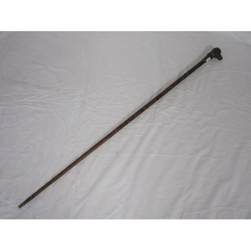192 - A skull crusher walking cane covered in leather washers, with heavy cast iron dog head handle. Overa... 