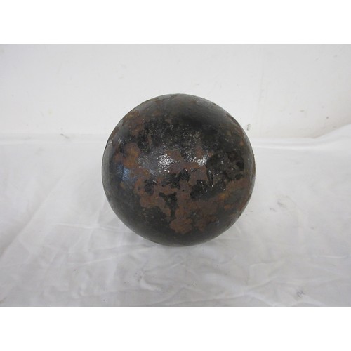 193 - A huge cast iron round shot Cannon Ball weighing approximately 15kgs with an approximate diameter of... 