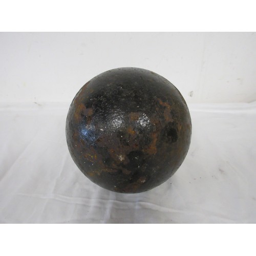 193 - A huge cast iron round shot Cannon Ball weighing approximately 15kgs with an approximate diameter of... 