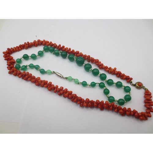 203 - A salmon red coral necklace and a green bead necklace with crystal spacers