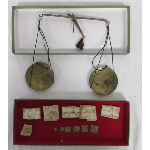 204 - A set of antique apothecary steel balance scales with brass pans with scruple and grain weights