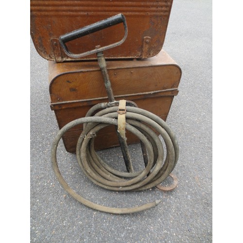 217 - A vintage Merryweather stirrup pump with hose and webbing hose retainer, believed to be WW2-era ARP