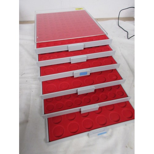 185 - Six Linder Perspex coin trays which stack six trays in total.