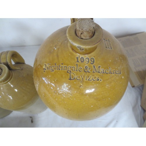 182 - A selection of earthenware flagons and bed warmers, one of the flagons by Doulton London and featuri... 