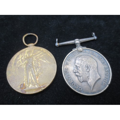 198 - A WW1 medal pair comprising British War Medal and VIctory Medal both awarded to 65665 Pte T Kempton ... 